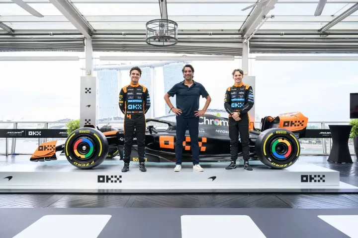 McLaren F1 Team driver Lando Norris, OKX Chief Marketing Officer Haider Rafique and McLaren F1 Team driver Oscar Piastri