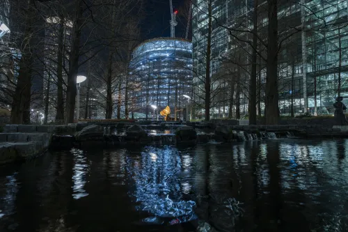 Lake in Jubilee Park with skyscraper under construction in the background #6