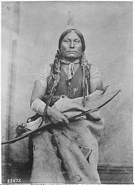 Gall (Pizi, Gaul), a Hunkpapa Sioux; three-quarter- length, seated. holding bow and arrow, Fort Buford, North Dakota #7