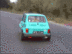 Car racing backwards logo